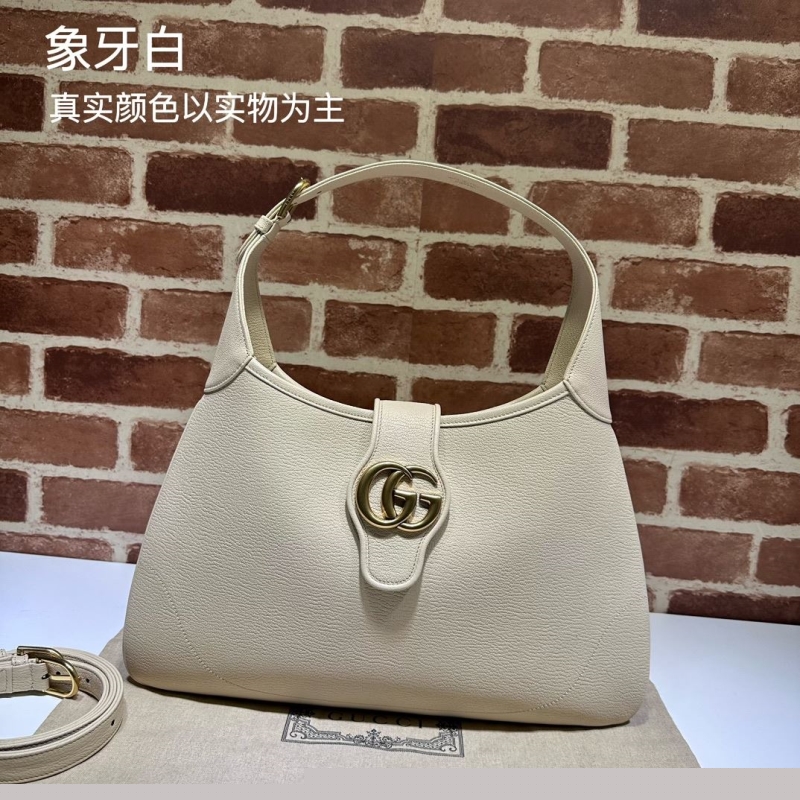 G*u*i top handle bags